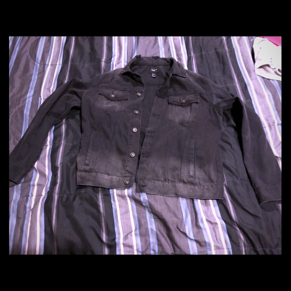 Distressed black denim jacket